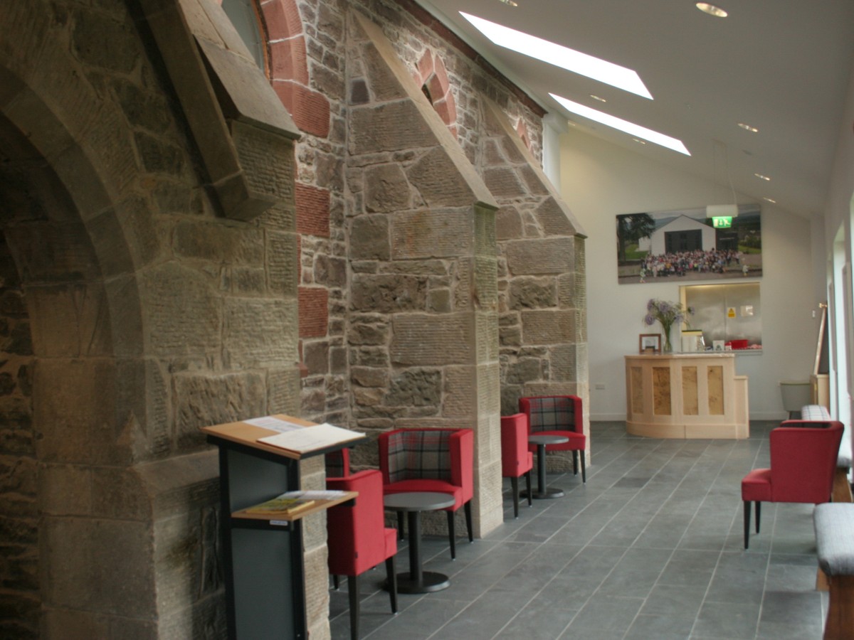 The community parish hall set up with tables and seating for events